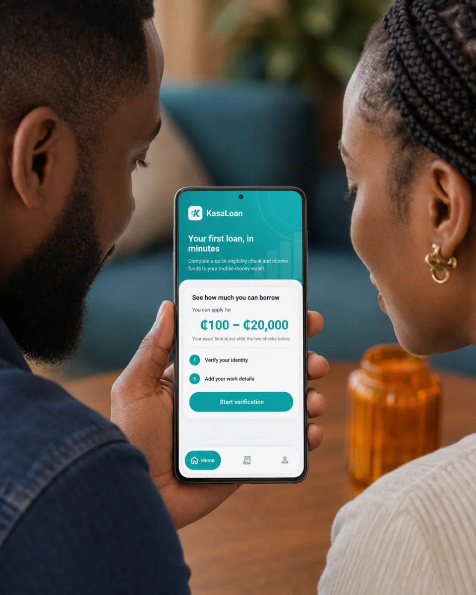 Two friends in Ghana looking together at the KasaLoan eligibility screen